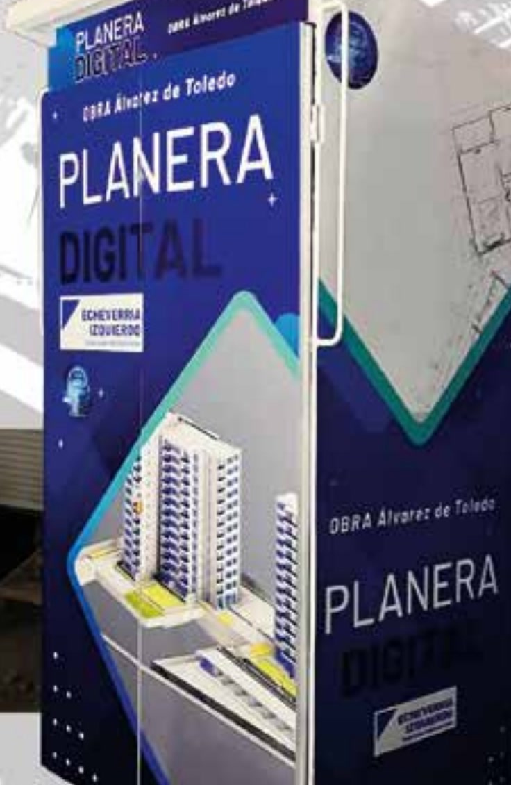 Stand metálico rotulado para sala de ventas inmobiliaria